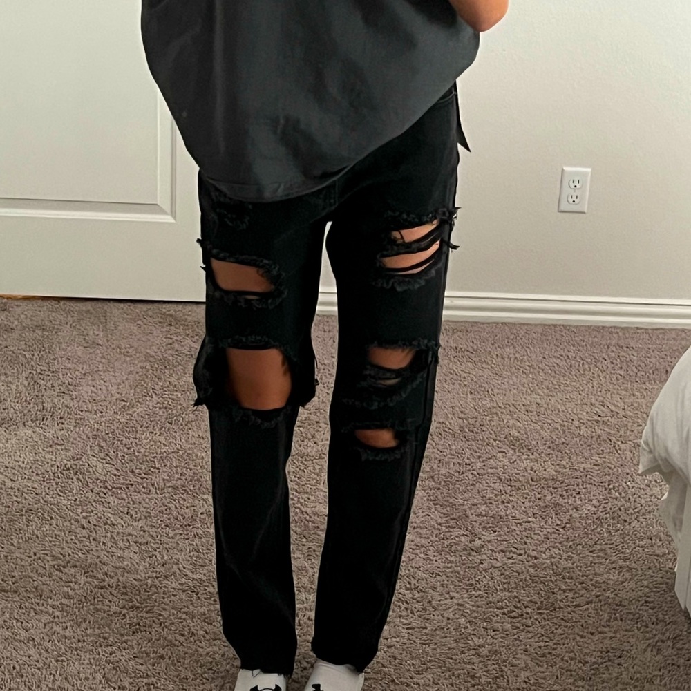 washed black extreme distressed black jean